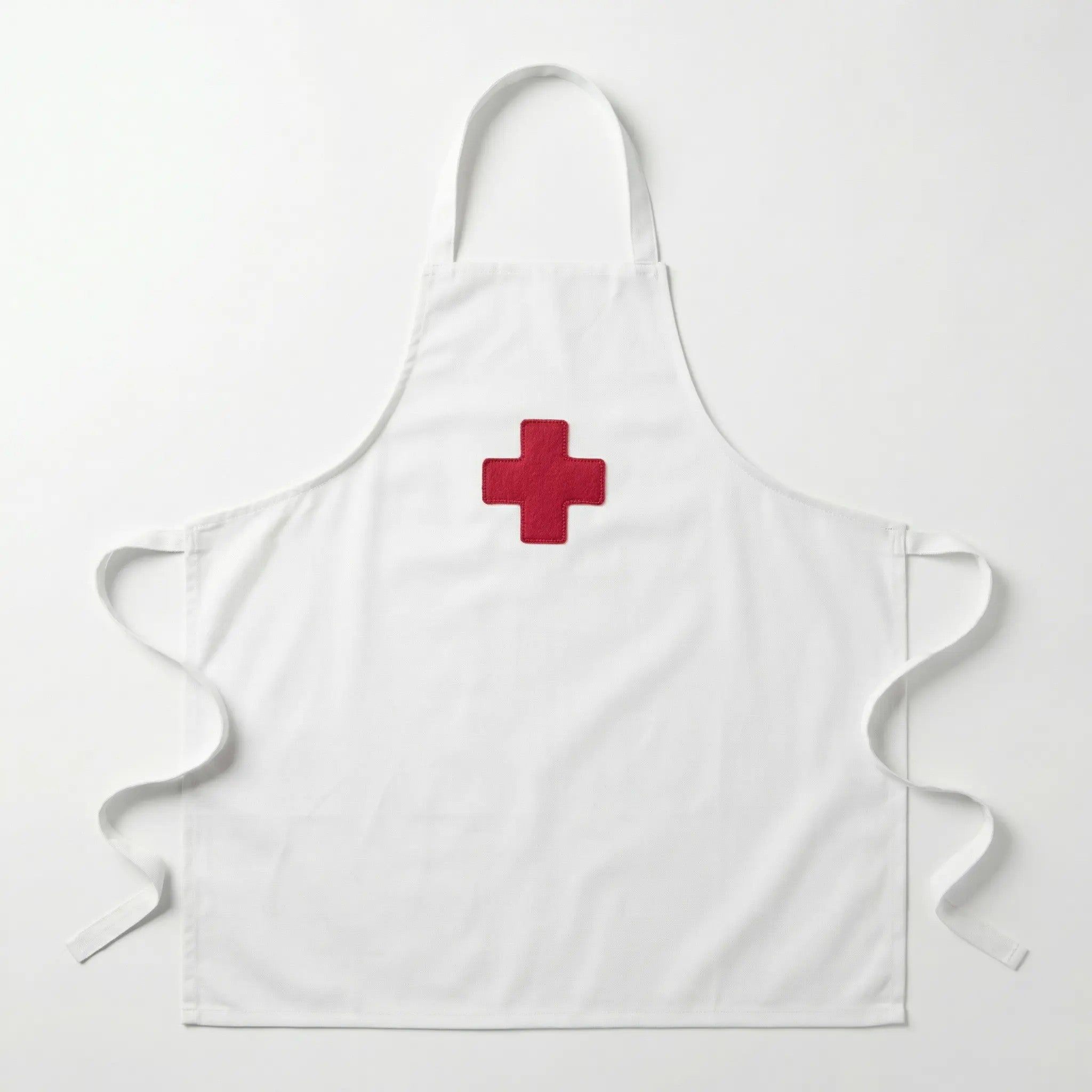 Delantal médico infantil blanco con cruz roja bordada en la parte frontal, confeccionado en tela de alta calidad para juego de doctor.