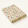 Mantel infantil de tela con estampado de setas y motivos naturales para mesa